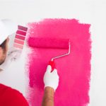 Worker choosing paint color